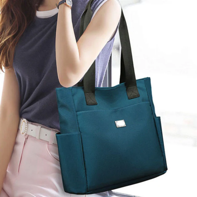 RevaCarry Large Multiple Compartments Handbag - Image 4